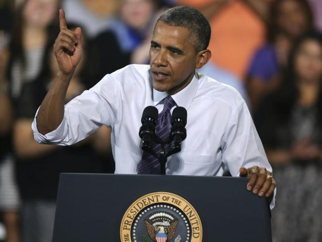 El presidente estadounidense, Barack Obama, pronuncia un discurso sobre la economía nacional y sus nuevas directrices en materia económica en Kansas City, Missouri (Estados Unidos) hoy, miércoles 30 de julio del 2014. EFE/Ed Zurga