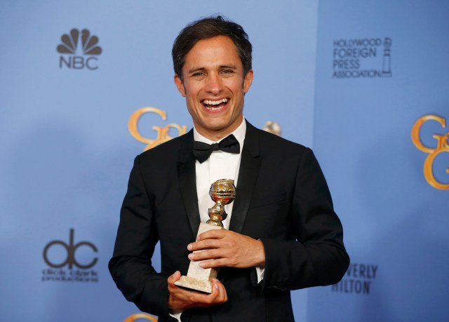 Actor Gael Garcia Bernal poses backstage with the award for Best Performance by an Actor in a Television Series - Musical or Comedy for his role in "Mozart in the Jungle" at the 73rd Golden Globe Awards in Beverly Hills, California January 10, 2016.  REUTERS/Lucy Nicholson