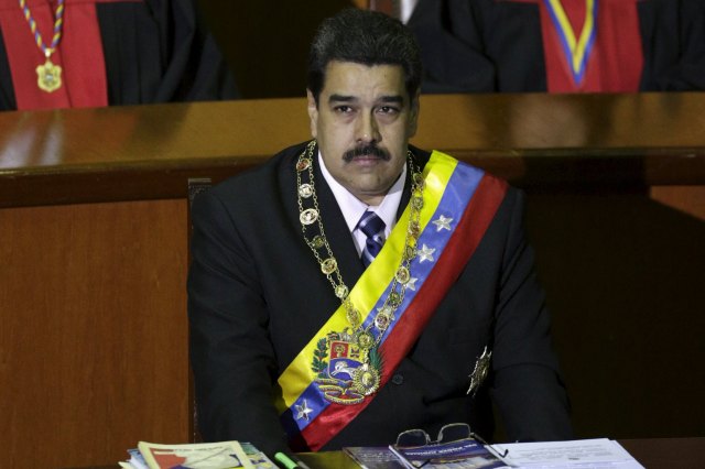Venezuela's President Nicolas Maduro attends a ceremony to mark the opening of the judicial year at the Supreme Court of Justice (TSJ) in Caracas, January 29, 2016. REUTERS/Marco Bello