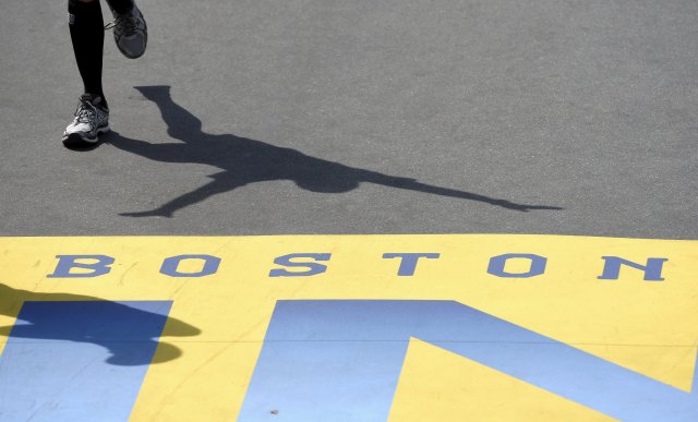 A runner approaches the finish line during the 120th running of the Boston Marathon in Boston, Massachusetts April 18, 2016. REUTERS/Gretchen Ertl