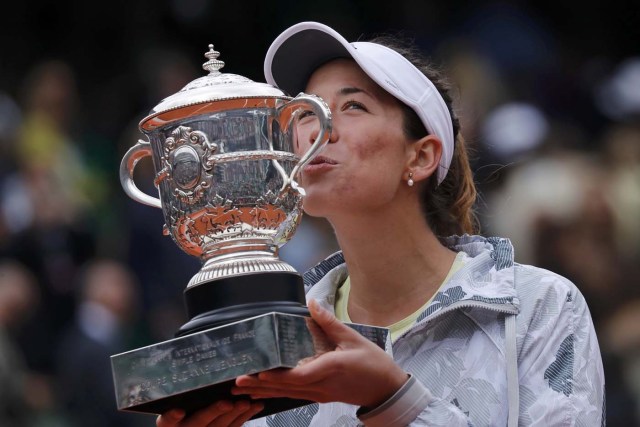 Tennis - French Open Women's Singles Final match - Roland Garros - Serena Williams of the U.S. vs Garbine Muguruza of Spain - Paris, France - 04/06/16. Garbine Muguruza poses with the trophy after beating Serena Williams.  REUTERS/Benoit Tessier  TPX IMAGES OF THE DAY