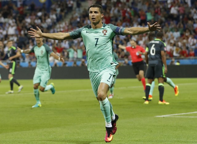 Football Soccer - Portugal v Wales - EURO 2016 - Semi Final - Stade de Lyon, Lyon, France - 6/7/16 Portugal's Cristiano Ronaldo celebrates after scoring their first goal  REUTERS/Carl Recine Livepic