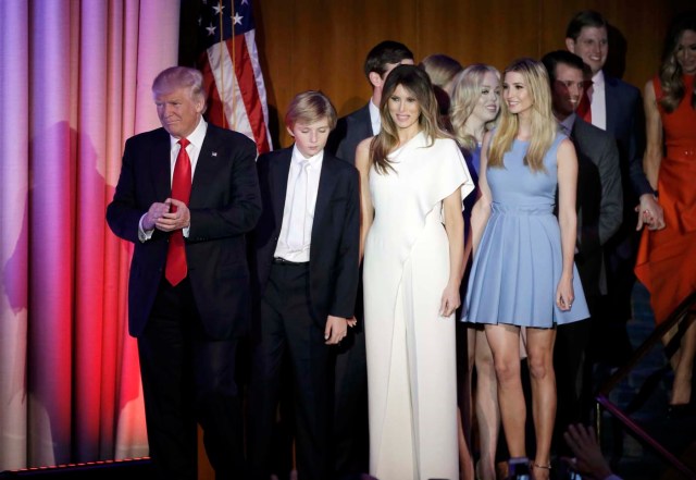 U.S. President-elect Donald Trump, his wife Melania, daughter Ivanka, son Barron and other family members greet supporters during his election night rally in Manhattan, New York, U.S., November 9, 2016. REUTERS/Mike Segar