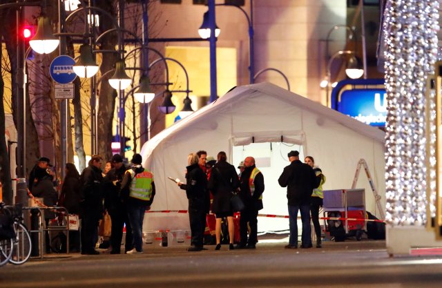 Police work near the site of an accident at a Christmas market in Berlin