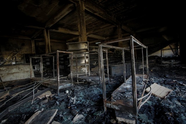 Damages are seen in a store after it was looted in Ciudad Bolivar, Venezuela December 19, 2016. REUTERS/William Urdaneta EDITORIAL USE ONLY. NO RESALES. NO ARCHIVE.