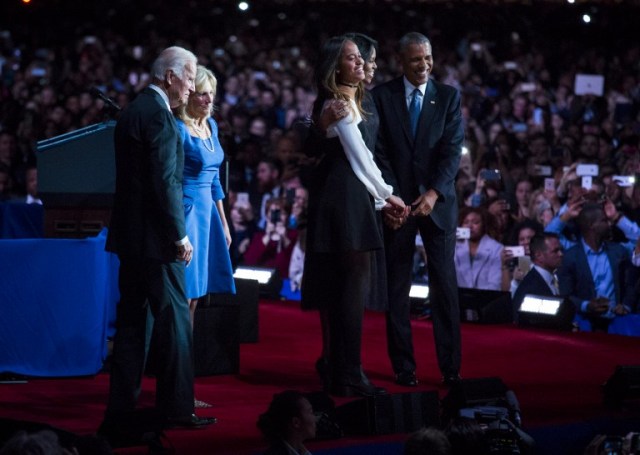 CHICAGO, IL - JANUARY 10: U.S. President Barack Obama, first lady Michelle Obama, daughter Malia Obama, Vice President Joe Biden and his wife Jill Biden stand on stage after Obama's farewell speech at McCormick Place on January 10, 2017 in Chicago, Illinois. Obama addressed the nation in what is expected to be his last trip outside Washington as president. President-elect Donald Trump will be sworn in as the 45th president on January 20. Darren Hauck/Getty Images/AFP