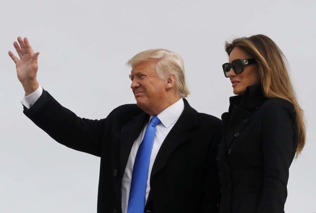 U.S. President-elect Donald Trump and his wife Melania arrive at Joint Base Andrews outside Washington, U.S. January 19, 2017, one day before his inauguration as the nation's 45th president. REUTERS/Jonathan Ernst