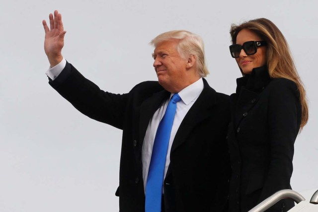 U.S. President-elect Donald Trump and his wife Melania Trump arrive aboard a U.S. Air Force jet at Joint Base Andrews, Maryland, U.S. January 19, 2017. REUTERS/Jonathan Ernst TPX IMAGES OF THE DAY