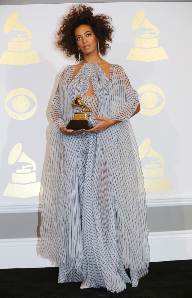 Solange poses with the award she won for Best R&B Performance for "Cranes in the Sky" at the 59th Annual Grammy Awards in Los Angeles, California, U.S. , February 12, 2017. REUTERS/Mike Blake