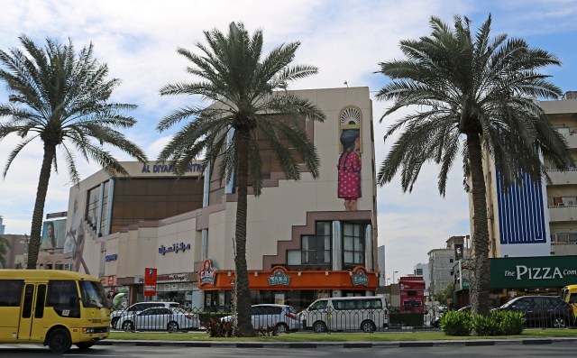 A general view shows graffiti by French artist Seth known as "The Globepainter" on 2nd of December street, which is part of the government-funded Dubai Street Museum project in Dubai on February 6, 2017. The streets of Dubai may be known for architectural superlatives like Burj Khalifa, the highest of the world's high-rises, and the Middle East's largest shopping centre Dubai Mall. But a group of street artists now also wants to turn the concrete walls of a fast-growing urban sprawl into an open-air museum that celebrates Emirati heritage and speaks to everyone in the multicultural city. / AFP PHOTO / NEZAR BALOUT