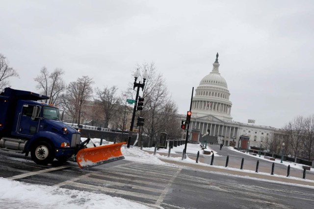 A snowplow is seen outside the Capitol Building in Washington, D.C., U.S. March 14, 2017. REUTERS/Aaron P. Bernstein