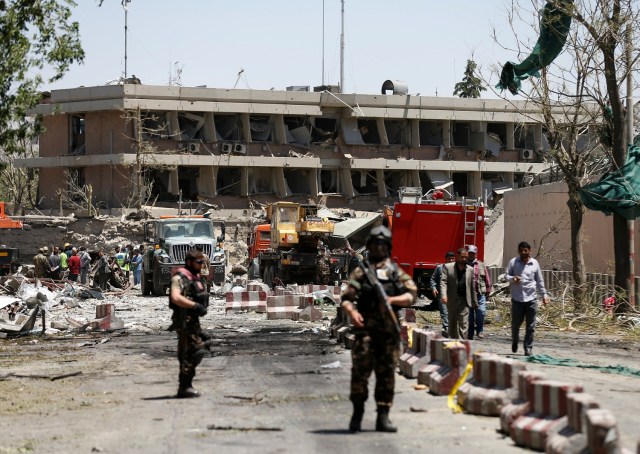 Afghan officials inspect outside the German embassy after a blast in Kabul, Afghanistan May 31, 2017. REUTERS/Mohammad Ismail