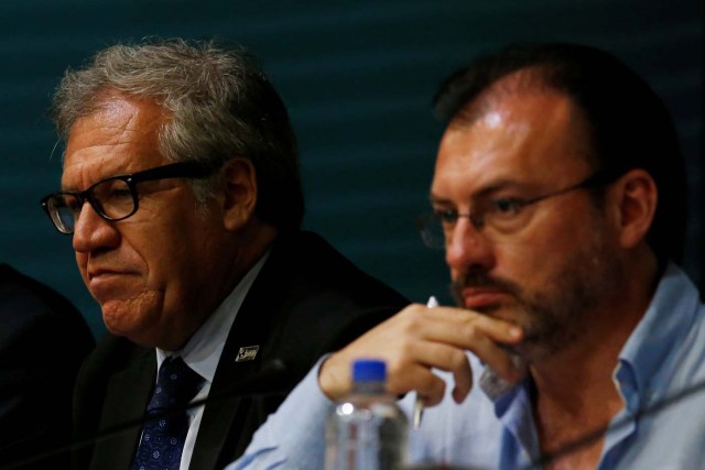 Organization of American States (OAS) Secretary General Luis Almagro looks on next to Mexico's Foreign Minister Luis Videgaray (R), during the OAS 47th General Assembly in Cancun, Mexico June 20, 2017. REUTERS/Carlos Jasso