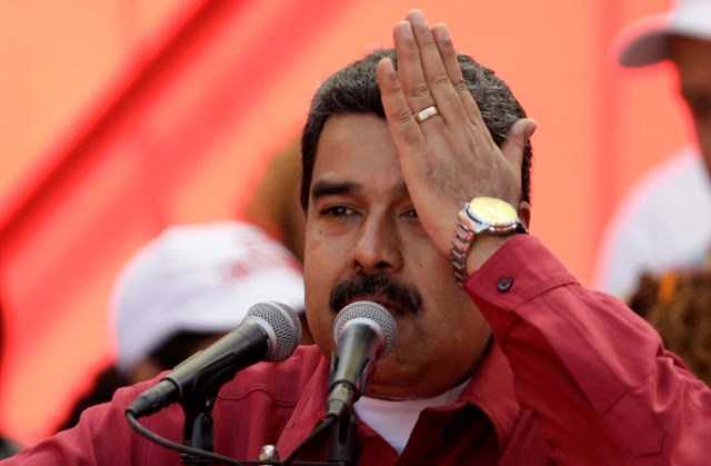 Venezuela's President Nicolas Maduro gives a speech at a rally against U.S. President Donald Trump in Caracas, Venezuela August 14, 2017. REUTERS/Ueslei Marcelino