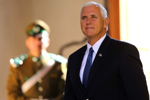 U.S. Vice President Mike Pence arrives to meet with Chile's President Michelle Bachelet (not pictured) at the government house in Santiago, Chile August 16, 2017. REUTERS/Ivan Alvarado