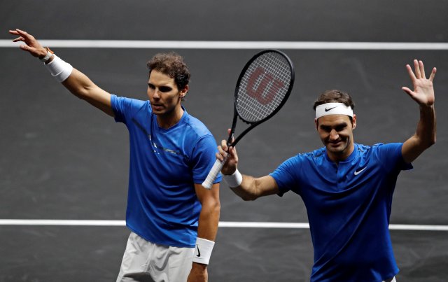 Tennis - Laver Cup - 2nd Day - Prague, Czech Republic - September 23, 2017 - Rafael Nadal and Roger Federer of team Europe react the match. REUTERS/David W Cerny