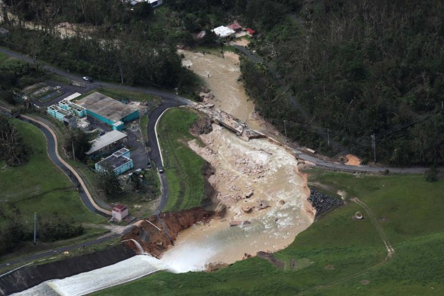 An aerial view shows the damage to the Guajataca dam in the aftermath of Hurricane Maria, in Quebradillas, Puerto Rico September 23, 2017. REUTERS/Alvin Baez