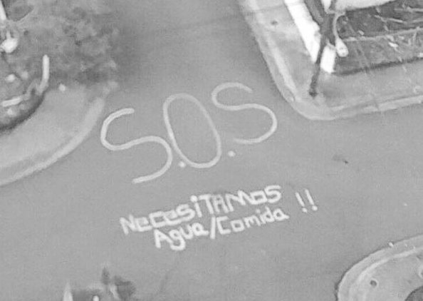 El desesperado mensaje de los Puertoriqueños que se ve desde el aire: S.O.S (FOTOS)