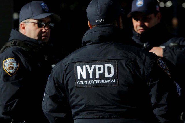 New York Police Department Counterterrorism Bureau members stand in Times Square to provide security ahead of New Year's Eve celebrations in Manhattan, New York, U.S., December 28, 2017. REUTERS/Andrew Kelly