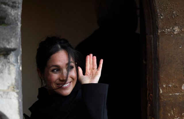 Meghan Markle greets well-wishers during a visit to Cardiff Castle with her fiancee Britain's Prince Harry in Cardiff, Britain, January 18, 2018. REUTERS/Toby Melville