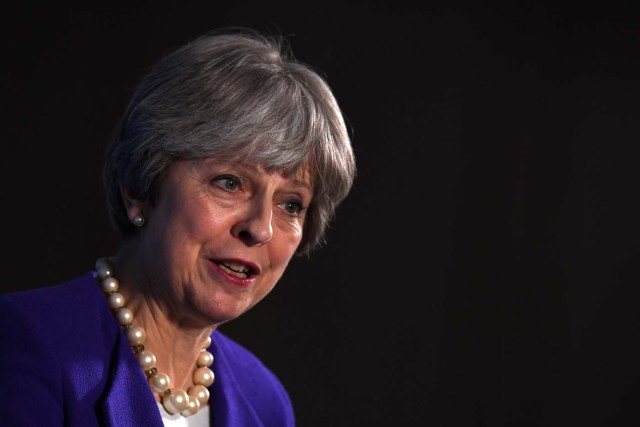 Britain's Prime Minister Theresa May gives a speech in Manchester, February 6, 2018. REUTERS/Paul Ellis/Pool