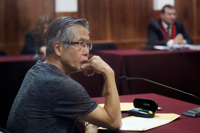 FILE PHOTO: Peru's former President Alberto Fujimori sits in court during the sentencing in his trial on charges of embezzling state funds to manipulate the media during his tenure as president, in Lima, Peru January 8, 2015. REUTERS/Enrique Castro-Mendivil/File Photo