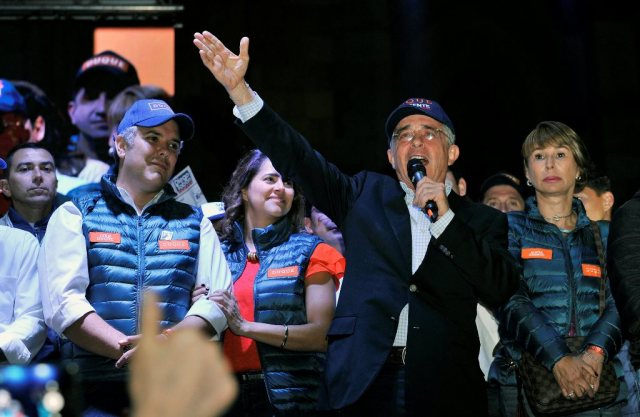 Colombian former President Alvaro Uribe and the presidential candidate of the Centro Democratico Ivan Duque are seen during the closing of their campaign before legislative elections in Bogota, Colombia March 4, 2018. Picture taken March 4, 2018. REUTERS/Carlos Julio Martinez NO RESALES. NO ARCHIVES.