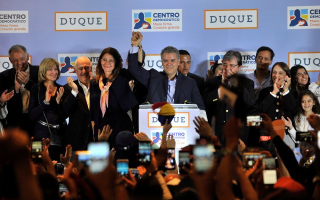 Ivan Duque, presidential candidate of the Centro Democratico party, gives a speech after knowing the results of the legislative elections in Bogota, Colombia March 11, 2018. REUTERS/Carlos Julio Martinez NO RESALES. NO ARCHIVES.