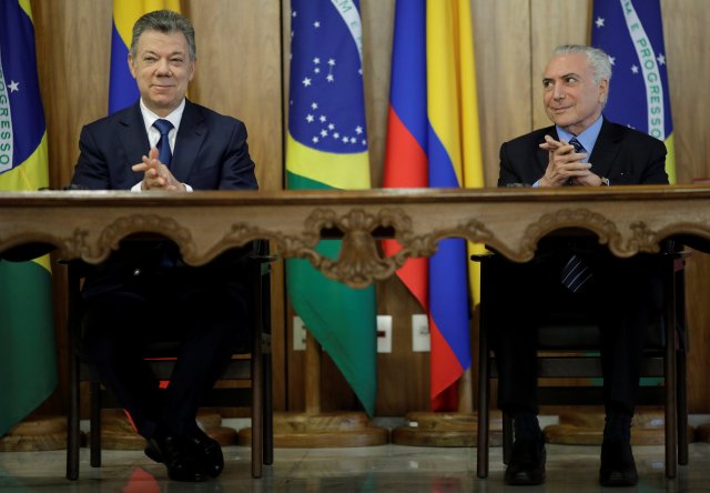 El presidente de Colombia, Juan Manuel Santos, y su homólogo brasileño, Michel Temer. REUTERS/Ueslei Marcelino