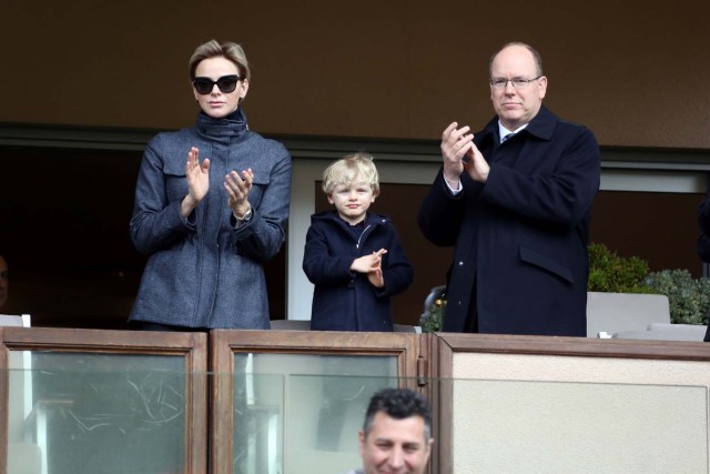 Princess Charlene of Monaco, Prince Jacques of Monaco and Prince Albert II of Monaco attend the International Rugby tournament Tournoi Sainte Devote at the Louis II Stadium in Monaco, March 31, 2018. Valery Hache/Pool via Reuters