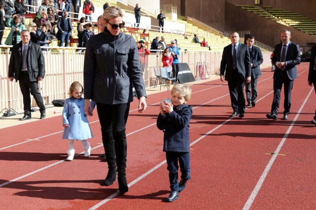 Princess Gabriella of Monaco, Princess Charlene of Monaco and Prince Jacques of Monaco attend the International Rugby tournament Tournoi Sainte Devote at the Louis II Stadium in Monaco, March 31, 2018. Valery Hache/Pool via Reuters