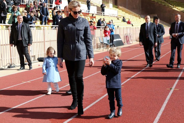 Princess Gabriella of Monaco, Princess Charlene of Monaco and Prince Jacques of Monaco attend the International Rugby tournament Tournoi Sainte Devote at the Louis II Stadium in Monaco on March 31, 2018. Valery Hache/Pool via Reuters