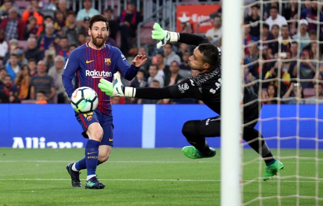 Soccer Football - La Liga Santander - FC Barcelona v Villarreal - Camp Nou, Barcelona, Spain - May 9, 2018   Barcelona's Lionel Messi scores their third goal    REUTERS/Albert Gea     TPX IMAGES OF THE DAY