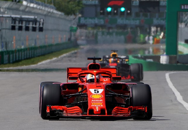 Formula One F1 - Canadian Grand Prix - Circuit Gilles Villeneuve, Montreal, Canada - June 9, 2018   Ferrari’s Sebastian Vettel in action with during qualifying   REUTERS/Carlo Allegri